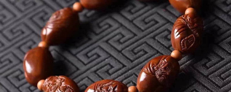 橄欖核玉化料是真的還是假的 橄欖核玉化料是真的還是假的